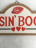 Valentine Kissing Booth With Lips and Arrow Sign