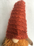 Harvest Gnome Sitting on Pumpkin