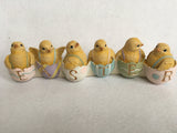 Easter Row of Chicks Sitting in Eggs Display